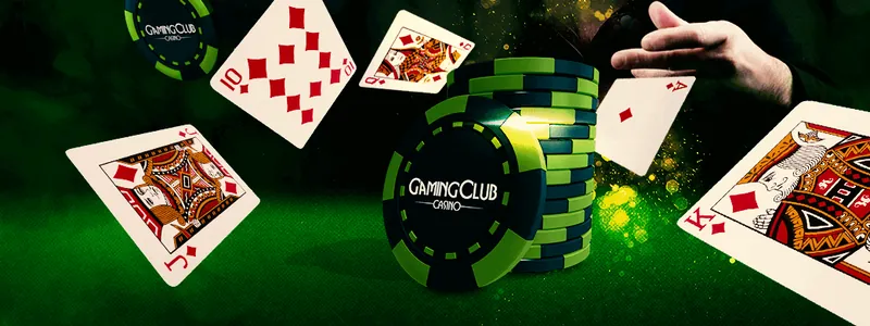Cards and Gaming Club chips flying over a green table
